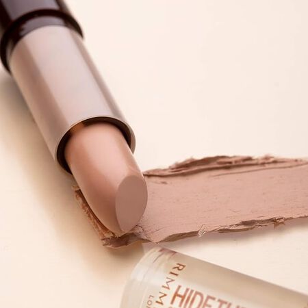 Corrector facial en barra Rimmel Hide Blemish 103